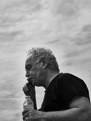 Corporate portrait of Ferrán Adriá. Conceptual with dramatic lighting in on location.