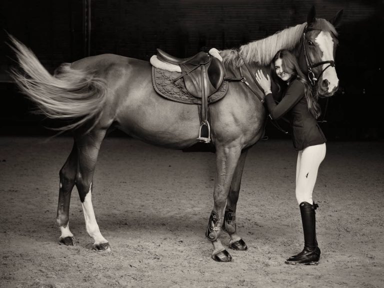 Blog 7 Celebrity en Barcelona Sira Martínez poses with her horse in an intimate portrait captured by celebrity photographer Julio Bárcena. Retrato de los jinetes de élite Sira Martínez y Alex Codina en Barcelona, Real Club de Polo para La VAnguardia Magazine